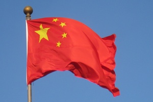 The Chinese flag: a red background with yellow stars