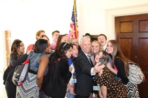 A picture of Rep. Bill Johnson, R-Ohio, taking a selfie with a group of students that was deleted from his official Twitter feed.