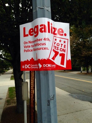 A marijuana legalization poster hangs on a lamp post in Washington, D.C.
