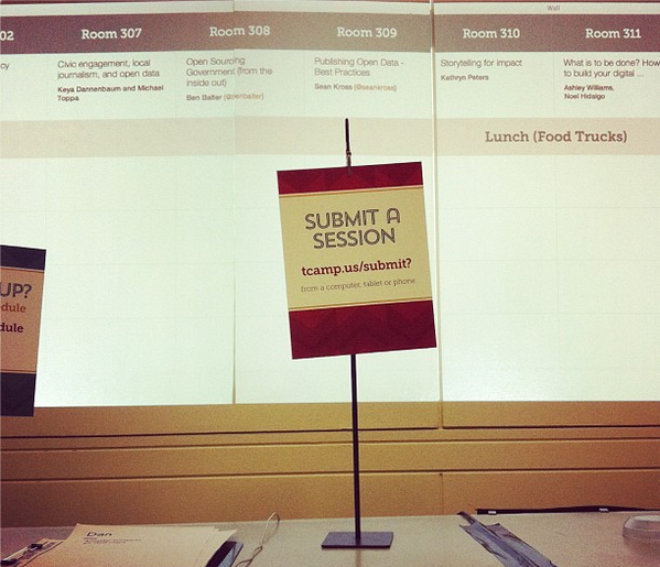 A sign reading "Submit a Session" at TransparencyCamp.