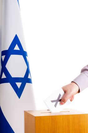 Image of ballot box with backdrop of israeli flag