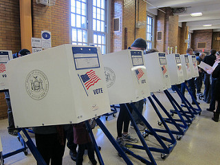 Voting boxes with american flag