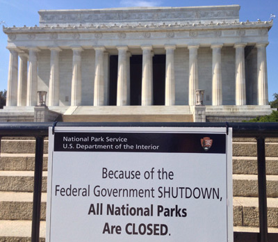A sign about the 2013 government shutdown seen outside a fence around the Lincoln Memorial in Washington DC.