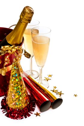 Image of champagne bucket, glasses and New Year's hats.