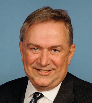 Official portrait of Rep. Steve Stockman, R-Texas, in front of blue background