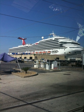 A photo deleted from the Twitter account of David Craig, a candidate for governor of Maryland, of the Carnival Conquest cruise ship at port beyond a parking lot.