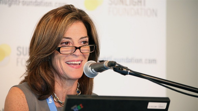 Ellen Miller speaking at a conference.