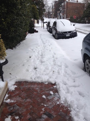 An image of the sidewalk in front of the home of Sen. Mark Warner, D-Va., taken and shared on Twitter by the National Republican Senatorial Committee.
