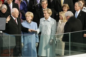 Image of Dick Cheney taking oath of office as his family and President George W. Bush look on