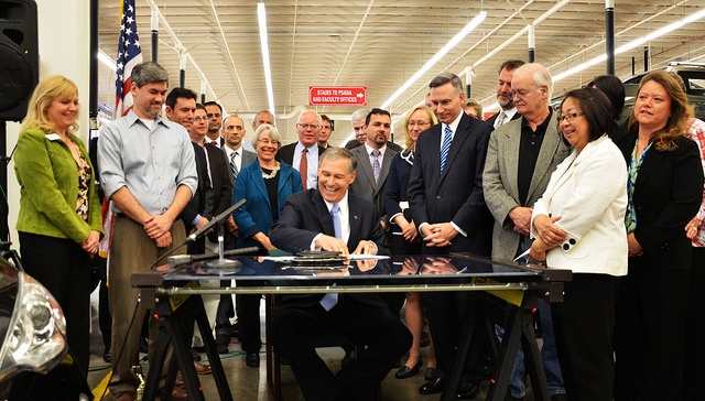 Washington Governor Jay Inslee signs EO 14-04, an executive order to reduce carbon pollution in the state.