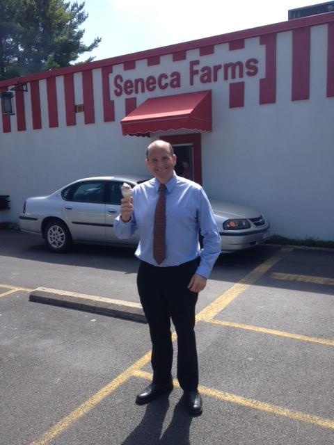 A photo of Rep. Tom Reed, R-N.Y., smiling while holding an ice cream cone in a parking lot that was deleted from his official account.
