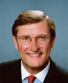 head and shoulder shot of Kent Conrad, white male with light brown hair, wire spectacles in suitcoat