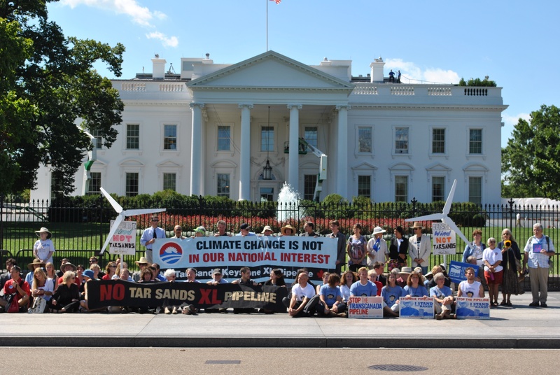 A few dozen protestors against the TransCanada pipeline pictured outside of the White House