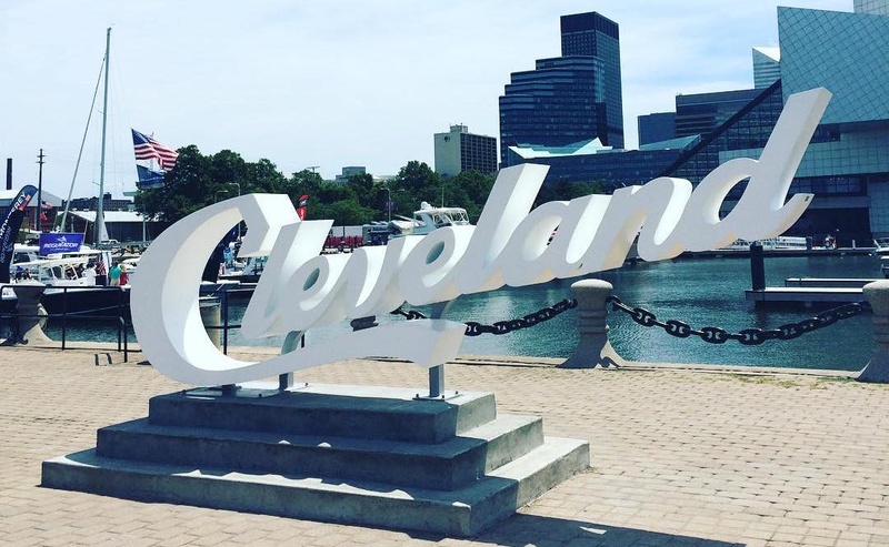 A statue spelling "Cleveland" near Lake Erie.