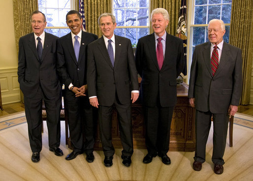 In January 2009, President of the United States of America, George W. Bush invited then President-Elect Barack Obama and former Presidents George H.W. Bush, Bill Clinton, and Jimmy Carter for a Meeting and Lunch at The White House. Photo taken in the Oval Office at The White House.