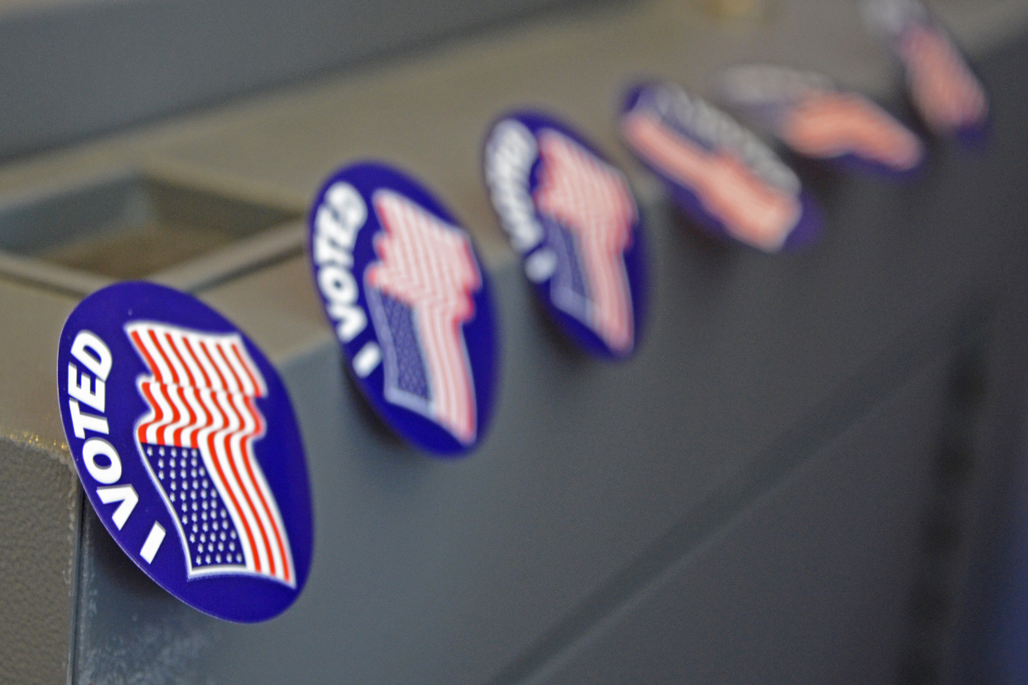    “I Voted” stickers are placed on the polling machine for voters to take after ballots are entered on April 7, 2015 in Columbia, Mo.