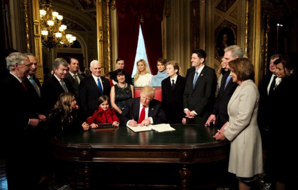 President Trump signs documents in the U.S. Capitol on January 20, 2017. [White House]
