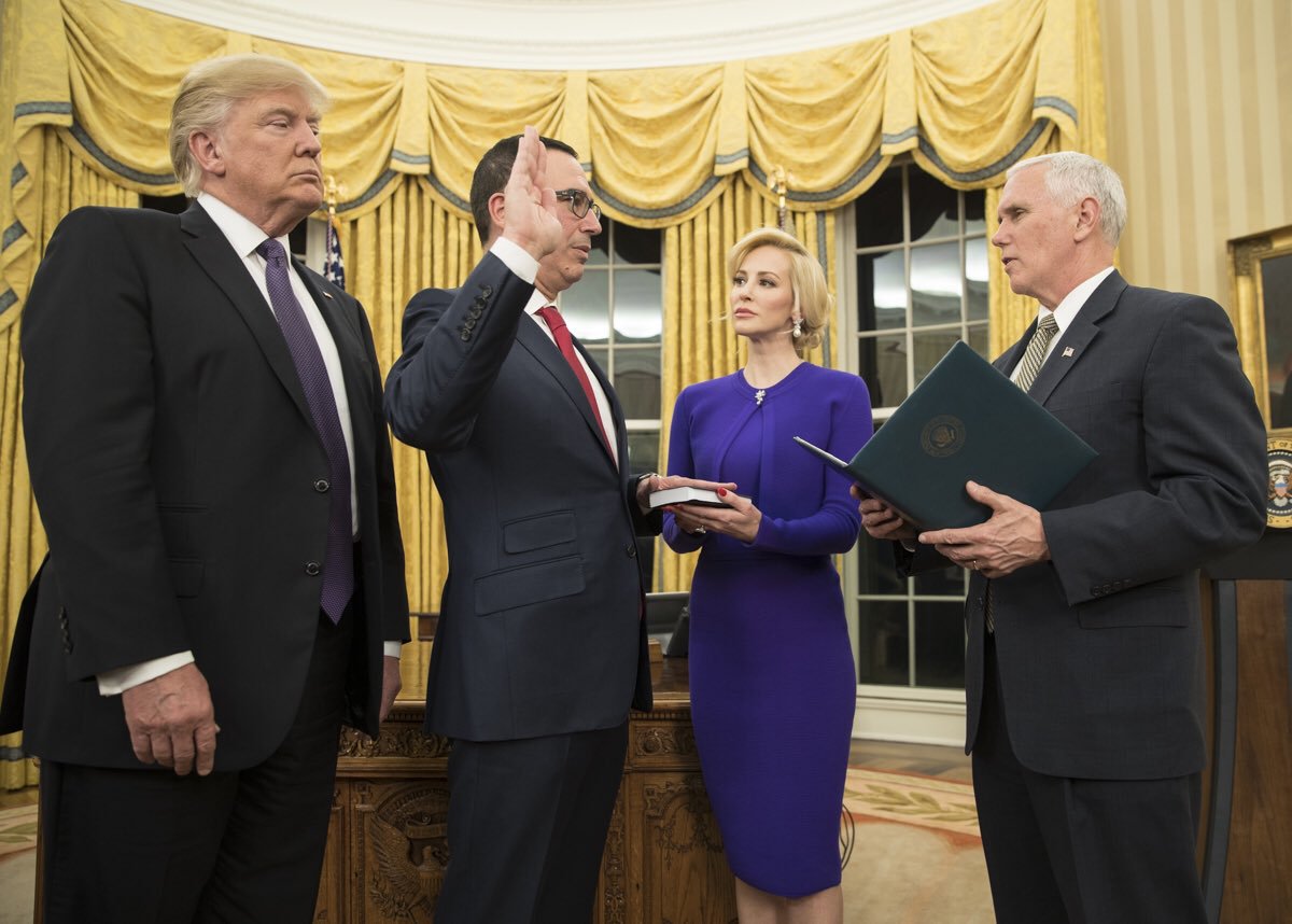 Treasury Secretary Steven Mnuchin is sworn in by Vice President Mike Pence in the Oval Office.  