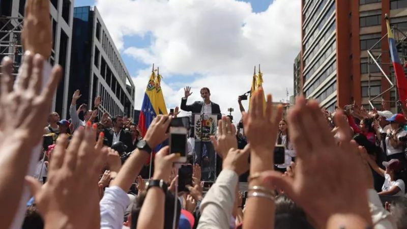 Juan Guaidó, the president of the National Assembly, as he swore himself in as the acting president of Venezuela at a protest in Caracas on January 23, 2019. Photo by Efecto Cucuyo