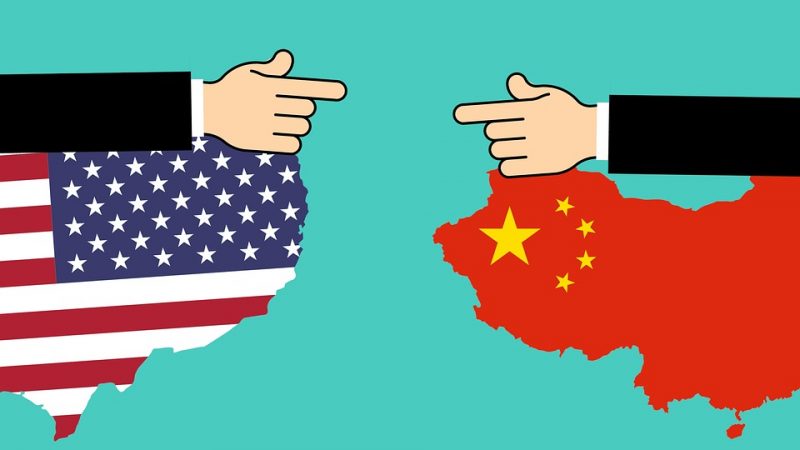 China and the United States, pointing fingers. 