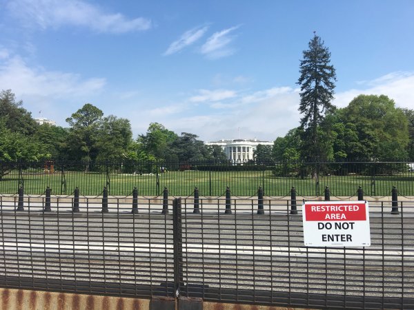 The White House, behind a restricted area sign. 